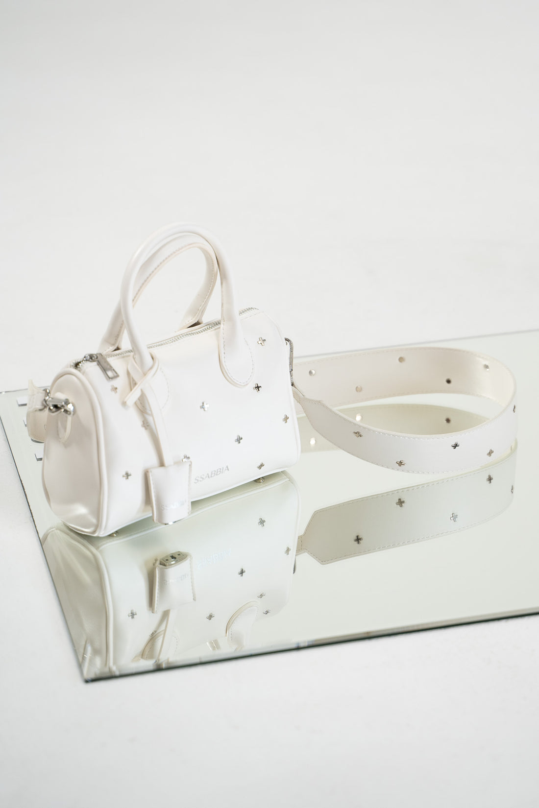 The Deja Vu SSABBIA Studded White Handbag